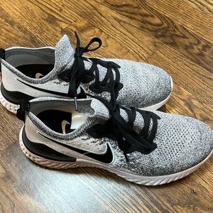 Women’s Nike Epic React Tennis shoes.  Size 9, good condition.